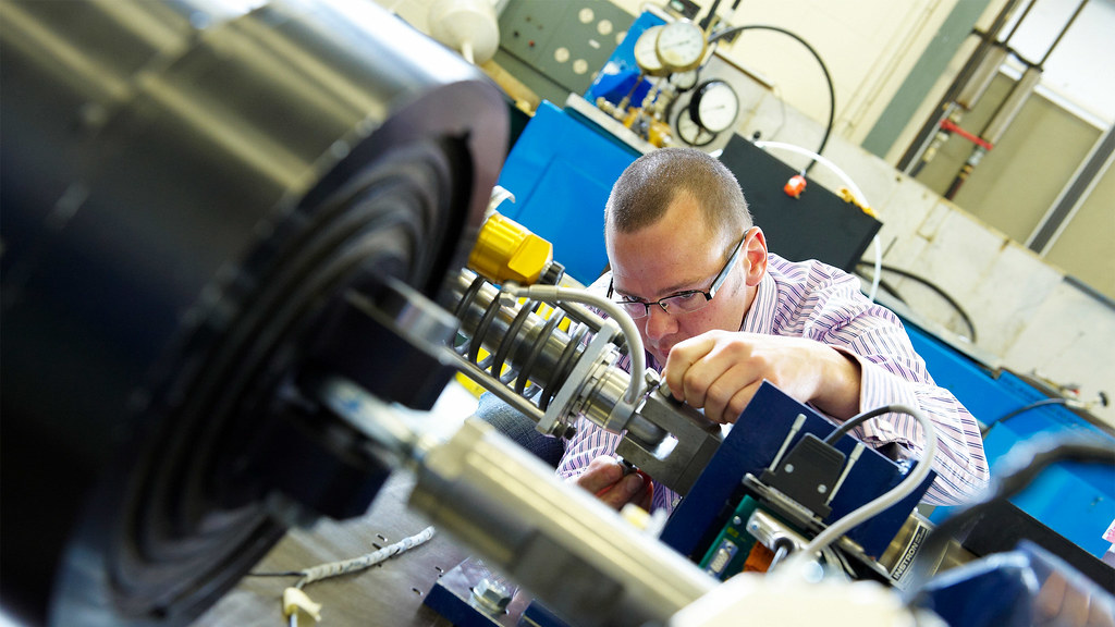 Man works on fuel rig in laboratory